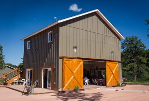 Our Carriage House Venue Building with large barn doors