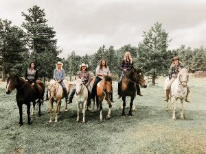 Riders line up while bareback