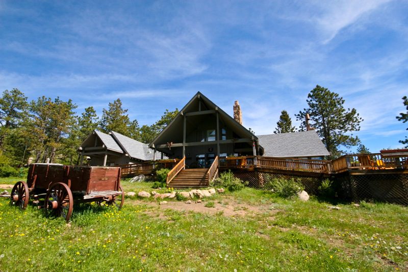 Exterior view of the Main Lodge at Sundance Trail, a Colorado guest ranch.