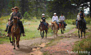 Trail Riders Headin' back to the Guest Ranch on horseback