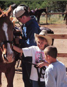 Dude Ranch Kids and Horses Kids meet their horses for the week