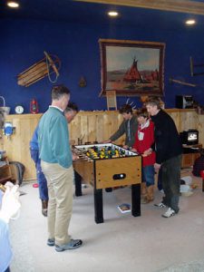 A family plays foosball