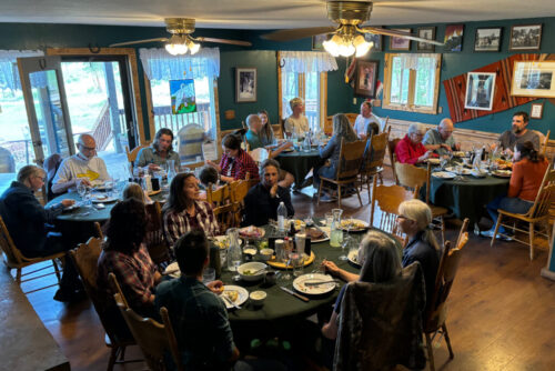 sundance-trail-guest-ranch-family-style-dining guests eating family-style